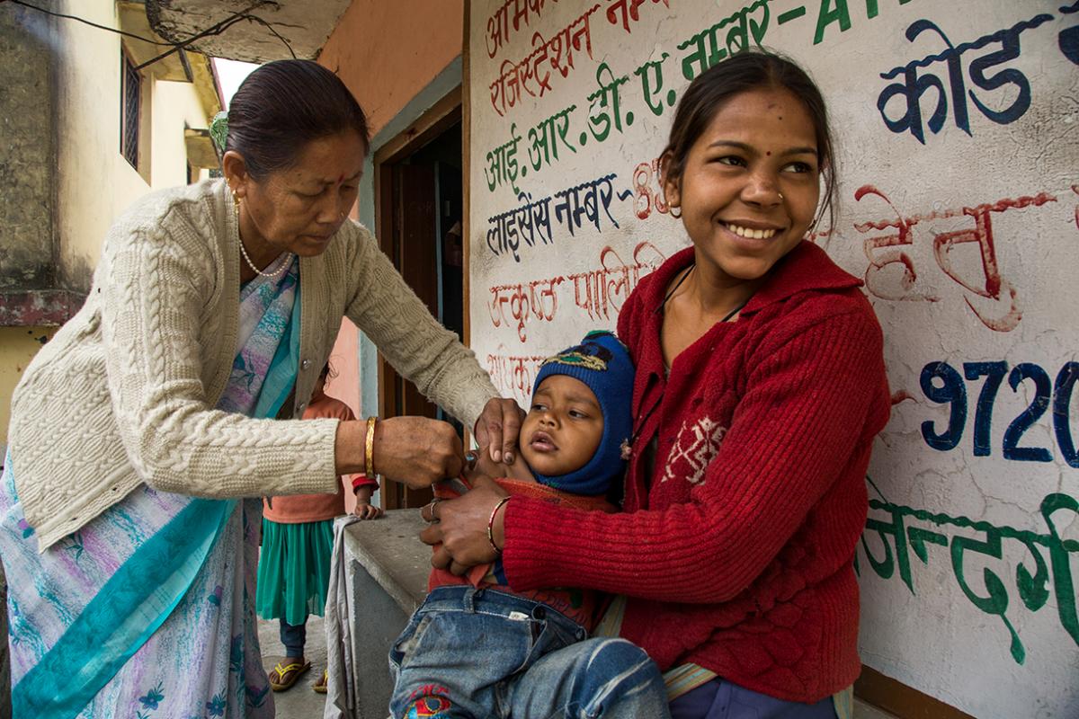 ANM Saraswati gives a measles rubella vaccine 