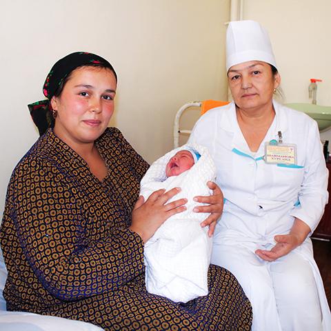 Gulrukhsor cradles her new baby 