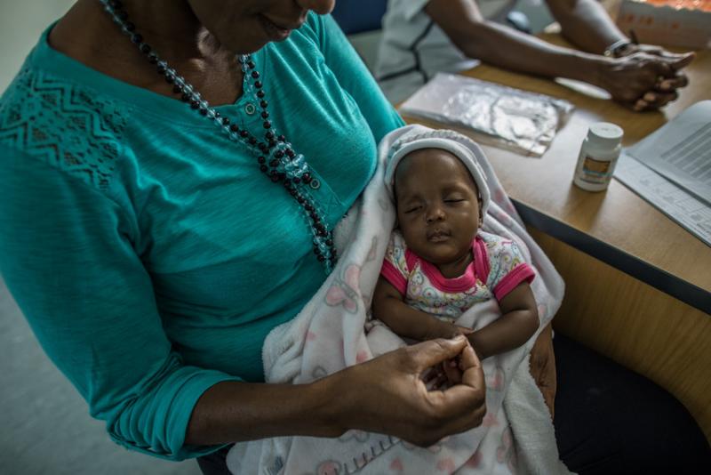Shanamutango HIV clinic helps HIV-positive mothers like Katrina prevent transmitting the virus to their babies. Photo by Morgana Wingard for IntraHealth International.